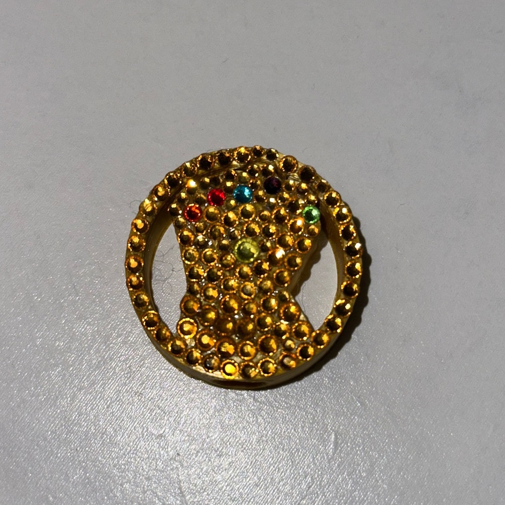 Infinity gauntlet straw charm.